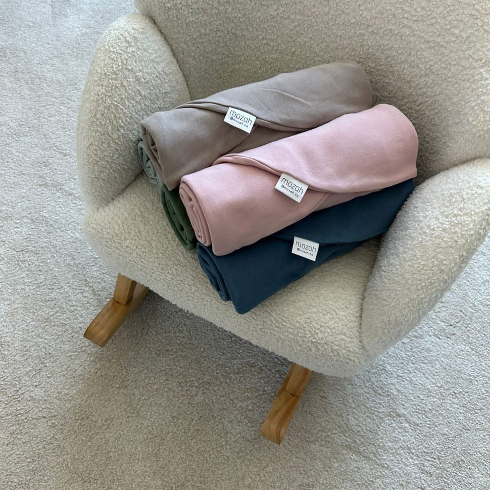 MOZAH newborn cover sized 30x24 inches fits most loungers.