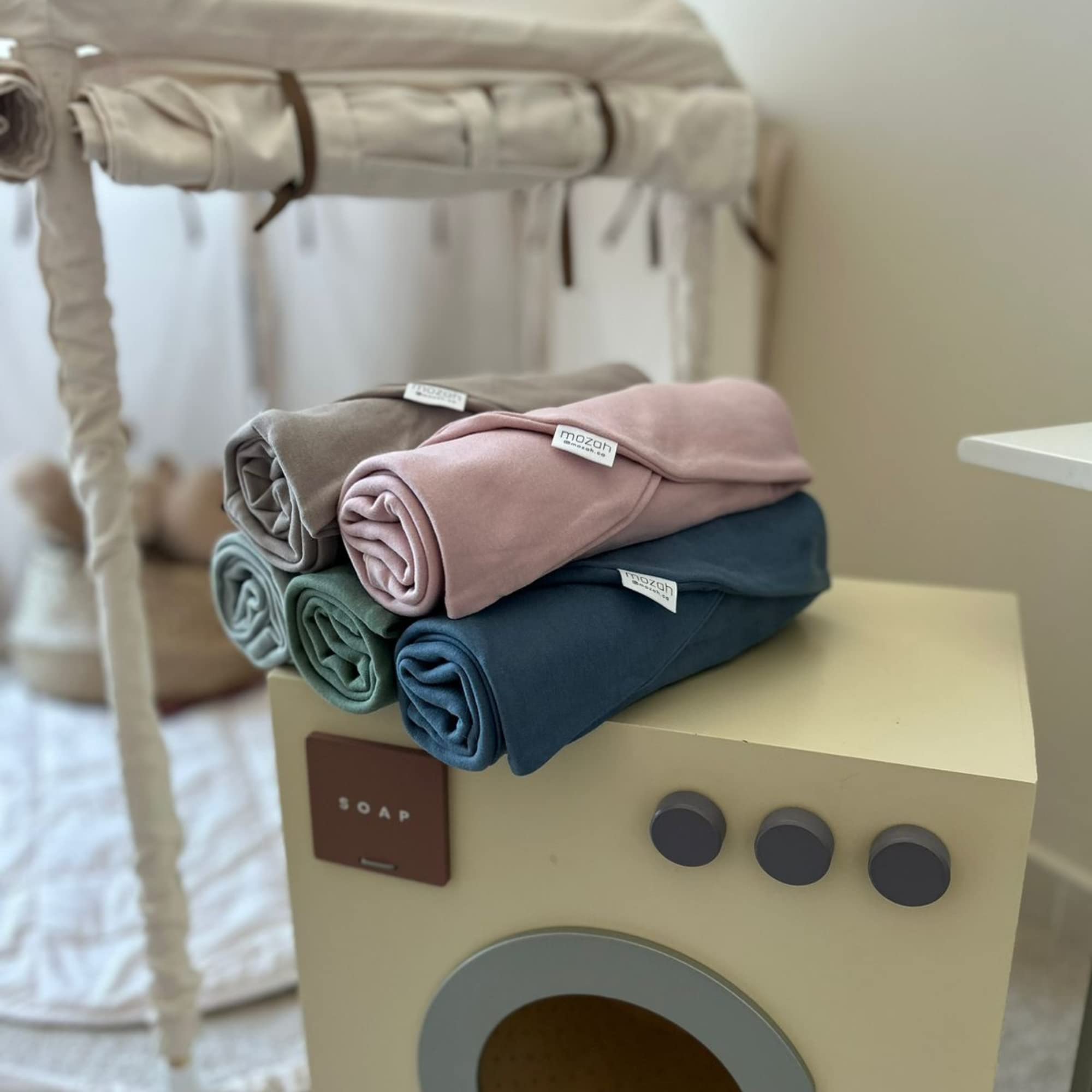 MOZAH cover makes a thoughtful baby shower gift with versatile color.