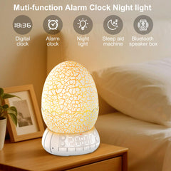 MTDYHY Dinosaur Egg Digital Clock keeps time clearly beside the bed.