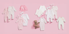 Mud Pie coordinating bow headband with pink sleeper for easy dressing and outfit.