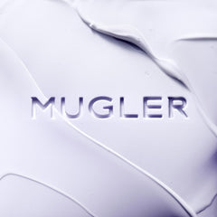 MUGLER Alien Body Lotion bottle-packaging showcases iconic star branding for premium skincare ritual.
