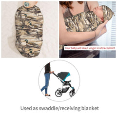 Muishi duck camouflage swaddle being wrapped around a newborn for a snug cocoon.