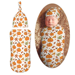 Muishi Fall Pumpkins swaddle blanket close-up reveals soft fabric and warmth.