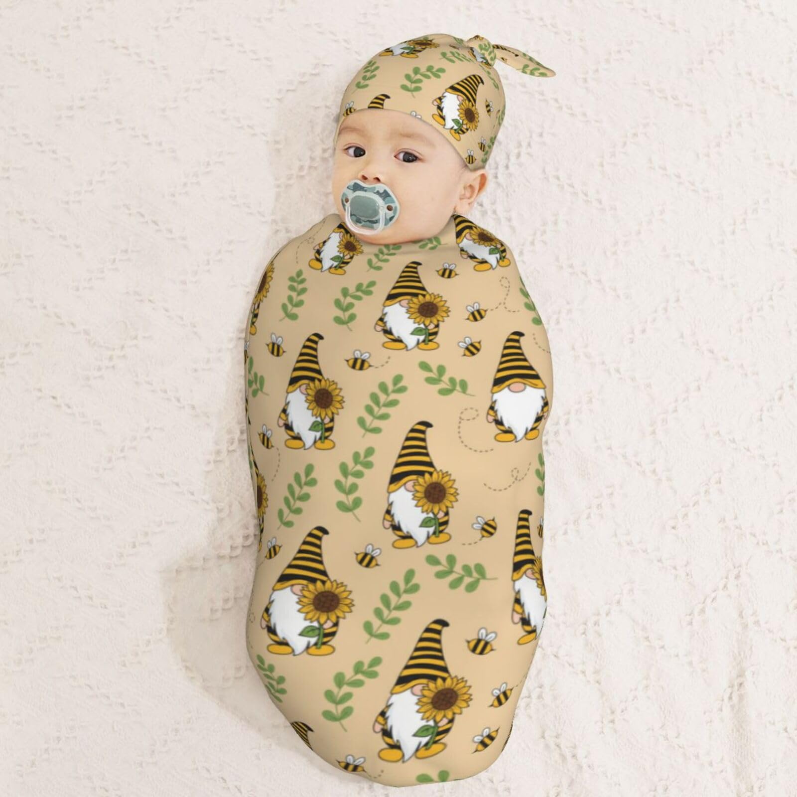 Folded Muishi Gnomes Bees Sunflowers swaddle blanket for easy use.