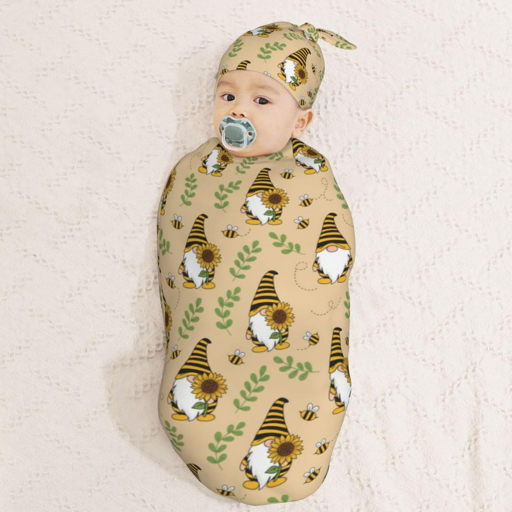 Folded Muishi Gnomes Bees Sunflowers swaddle blanket for easy use.