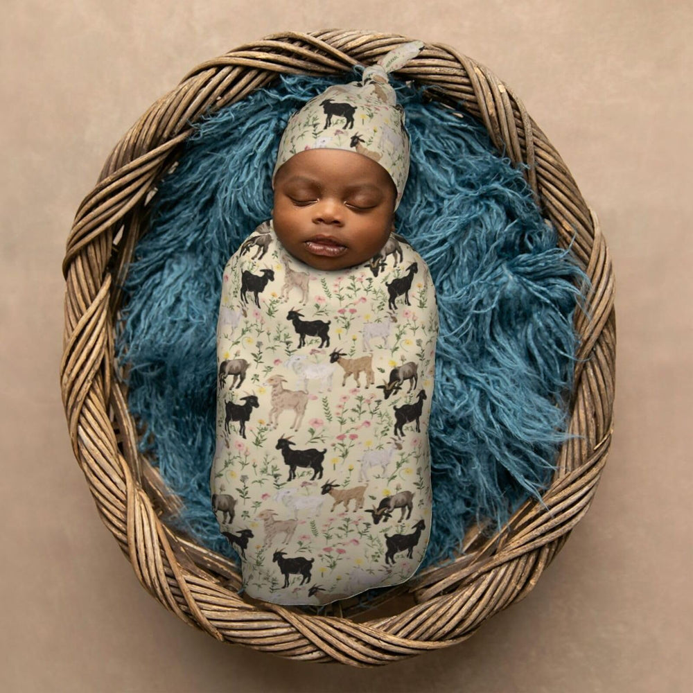 Muishi cozy swaddle on sleeping baby in a nursery setup