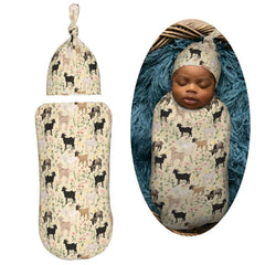 Muishi goats and flowers hat paired with swaddle blanket for snug newborn wearing