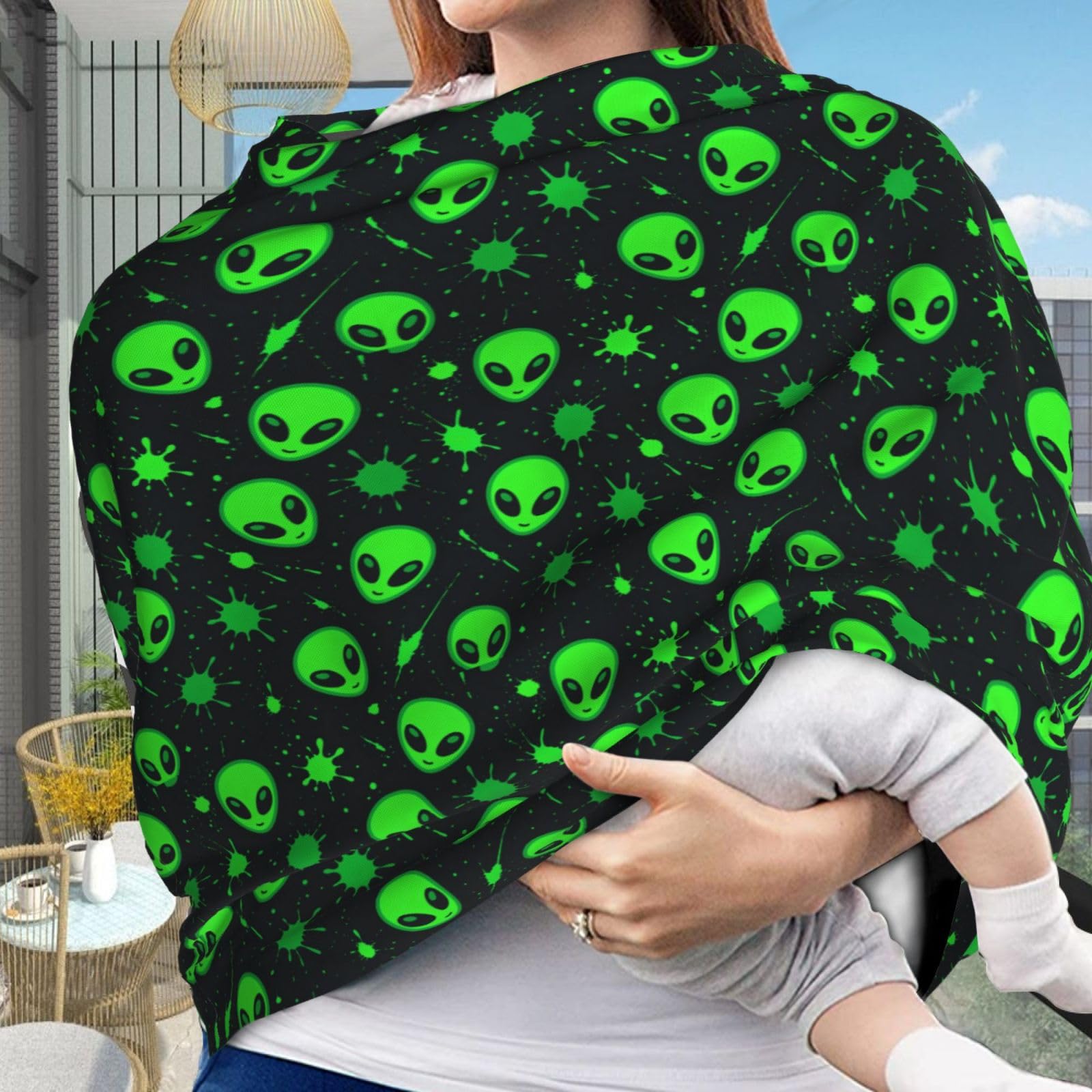 Muishi Green Alien Head canopy fully covers the infant seat to shield sun.