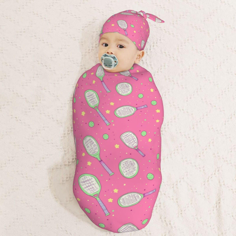 Muishi swaddle used as newborn photography prop for memorable portraits.