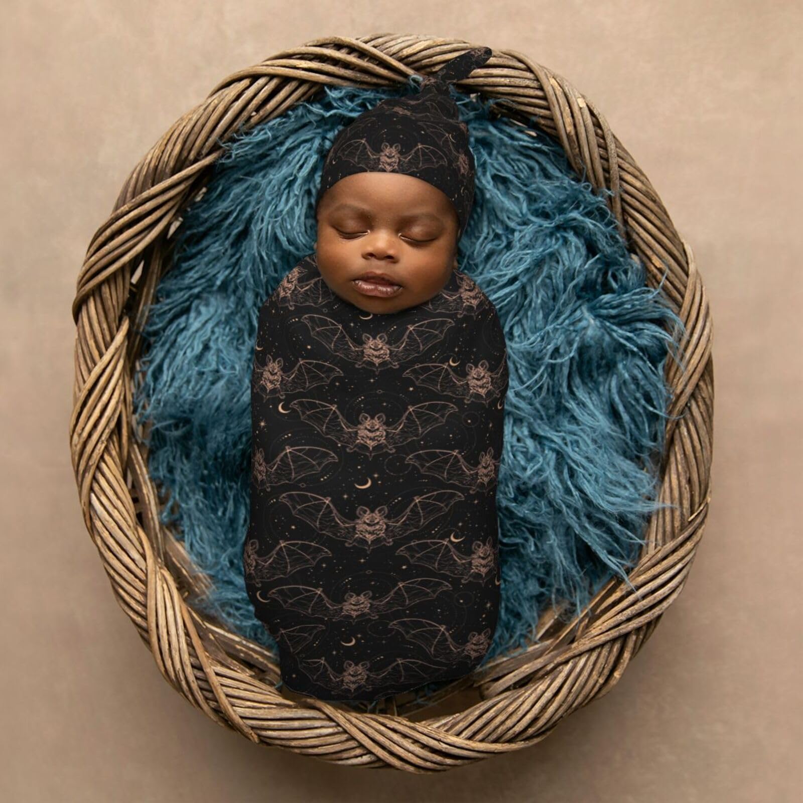 Muishi Night Bat Moon baby-in-swaddle scene shows cozy snug wrap