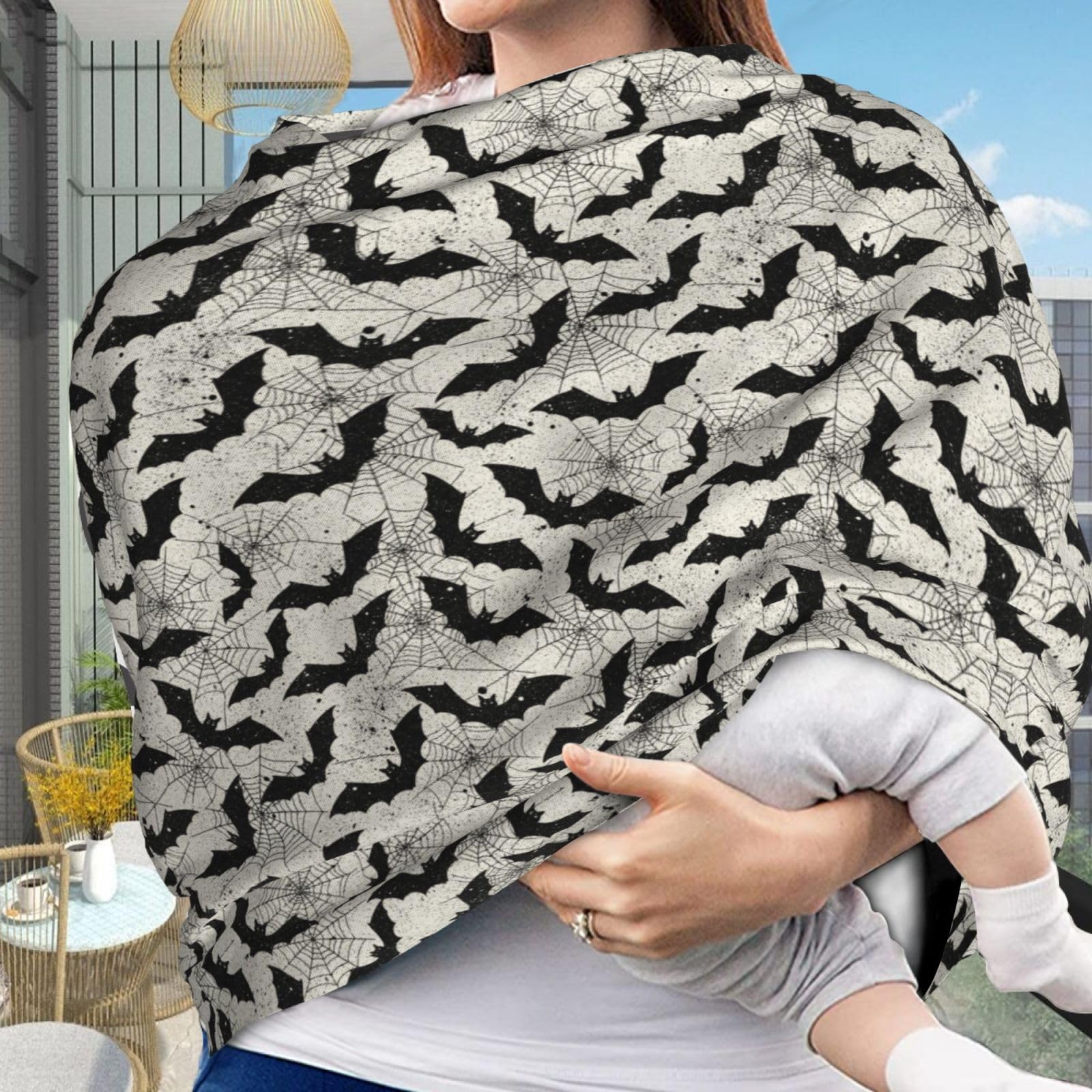 Muishi nursing cover providing private feeding space with breathable fabric.