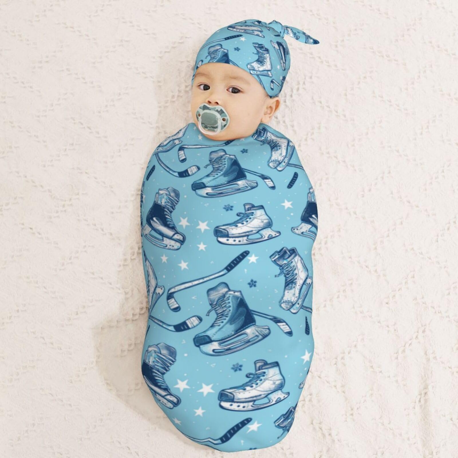 Muishi oval swaddle wrap helps secure the baby for peaceful sleep.