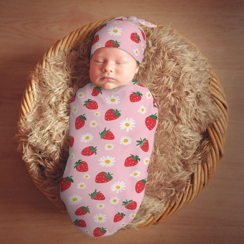 Muishi strawberry flowers 0-6 month size shown in use
