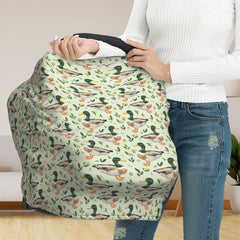 Muishi stroller cover in soft, stretchy fabric keeps baby comfortable on the go.
