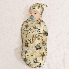Muishi swaddle blanket close-up shows smooth skin-friendly texture.