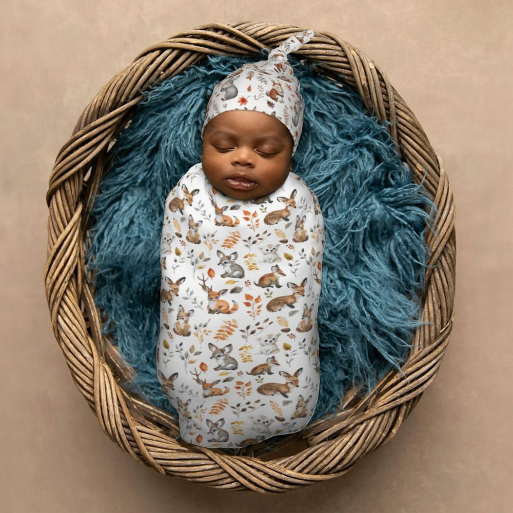 Muishi swaddle in use with cocoon design, secure, womb-like feel.