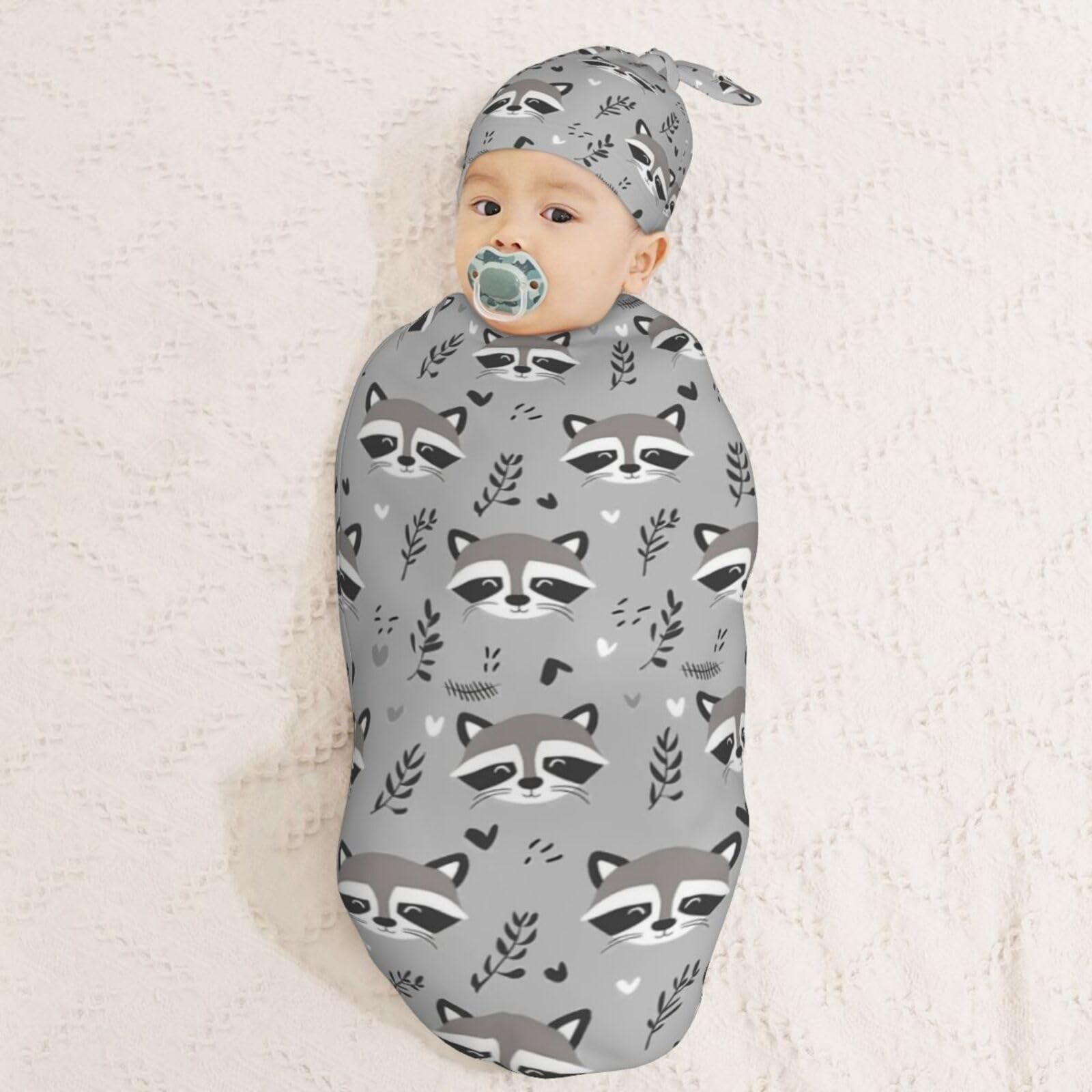 Muishi swaddle with oval cocoon wrap for a snug, sleep-friendly experience.
