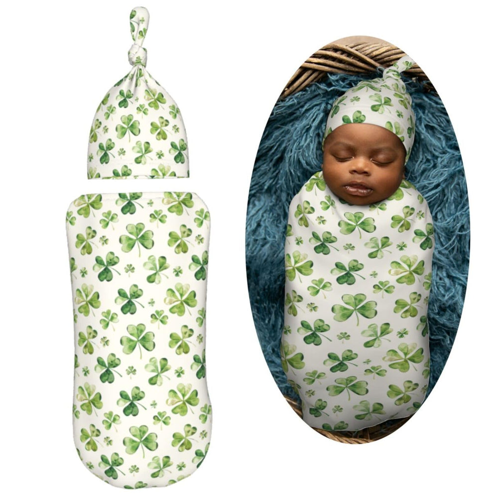 Muishi watercolor shamrock swaddle blanket wrapped baby demonstrates cocoon-like security.