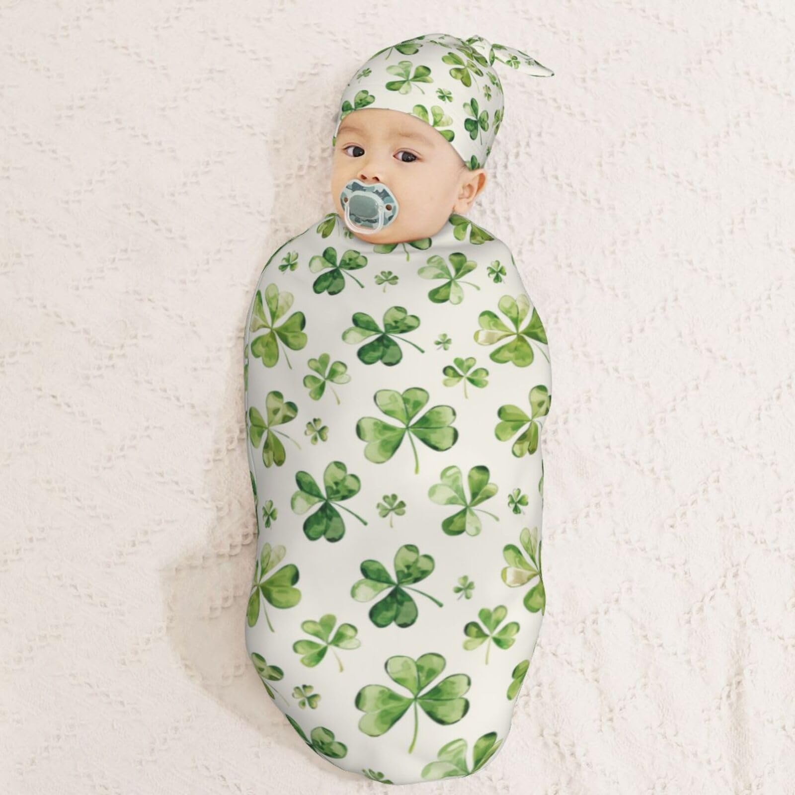 Muishi watercolor shamrock swaddle texture showcases plush feel against skin.