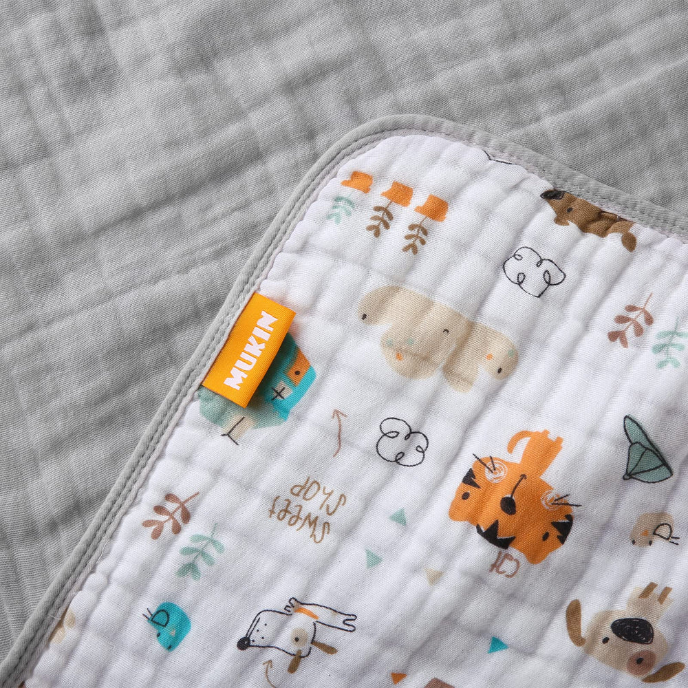 MUKIN breathable lightweight muslin blanket suitable for all seasons.