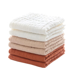 MUKIN baby washcloths in white provide a soft breathable touch during bath time.
