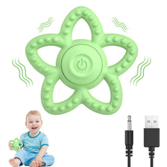 Mukoiber vibrating teether green close-up promotes gentle gum comfort.