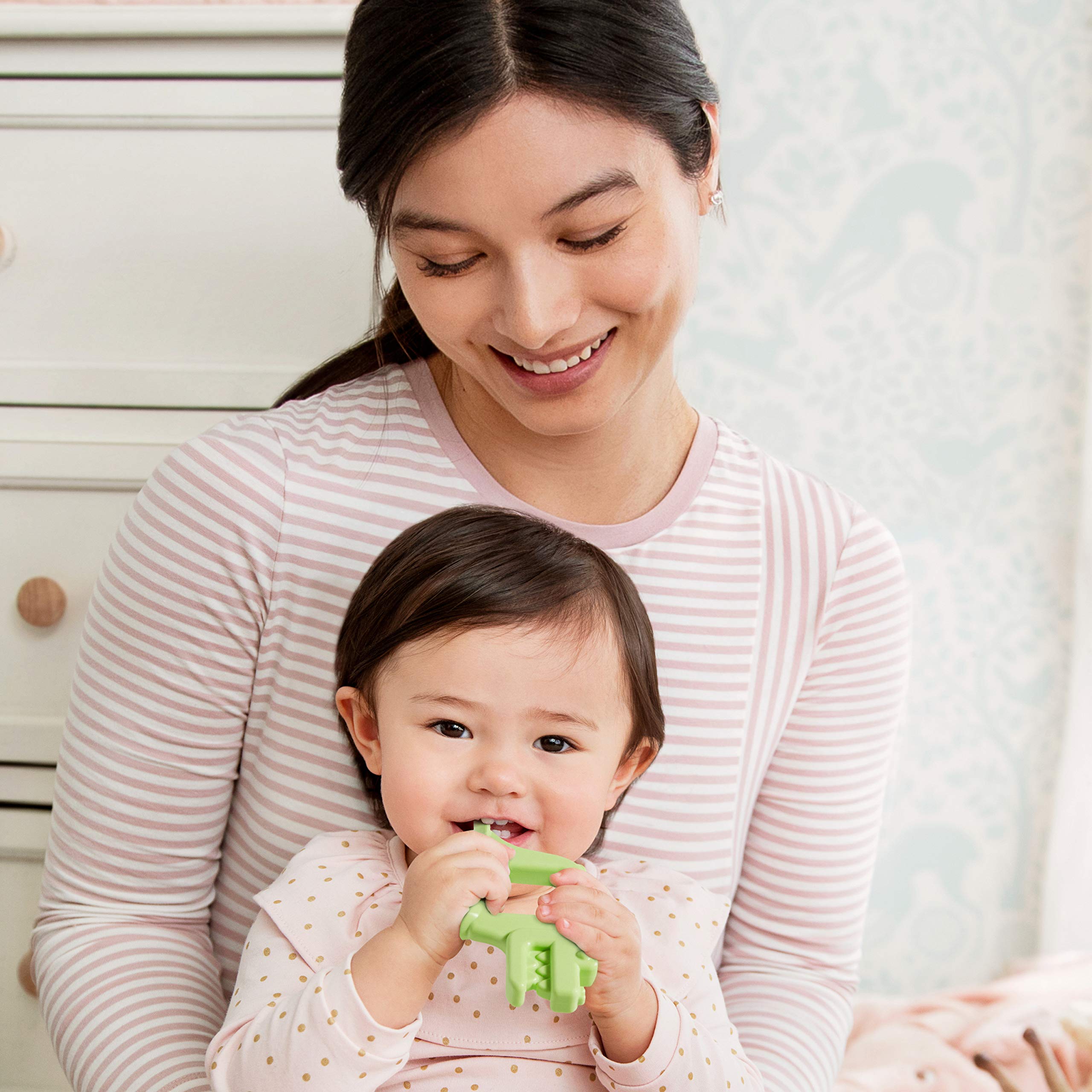 Munchkin Baby Toon Alligator ridged body massages gums during chewing.