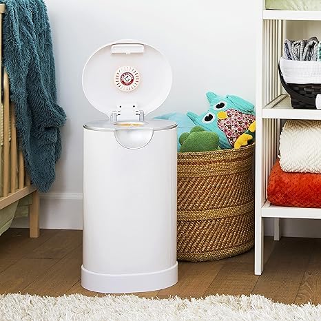 Munchkin diaper pail deodorizer disc in lavender scent refreshes nursery.