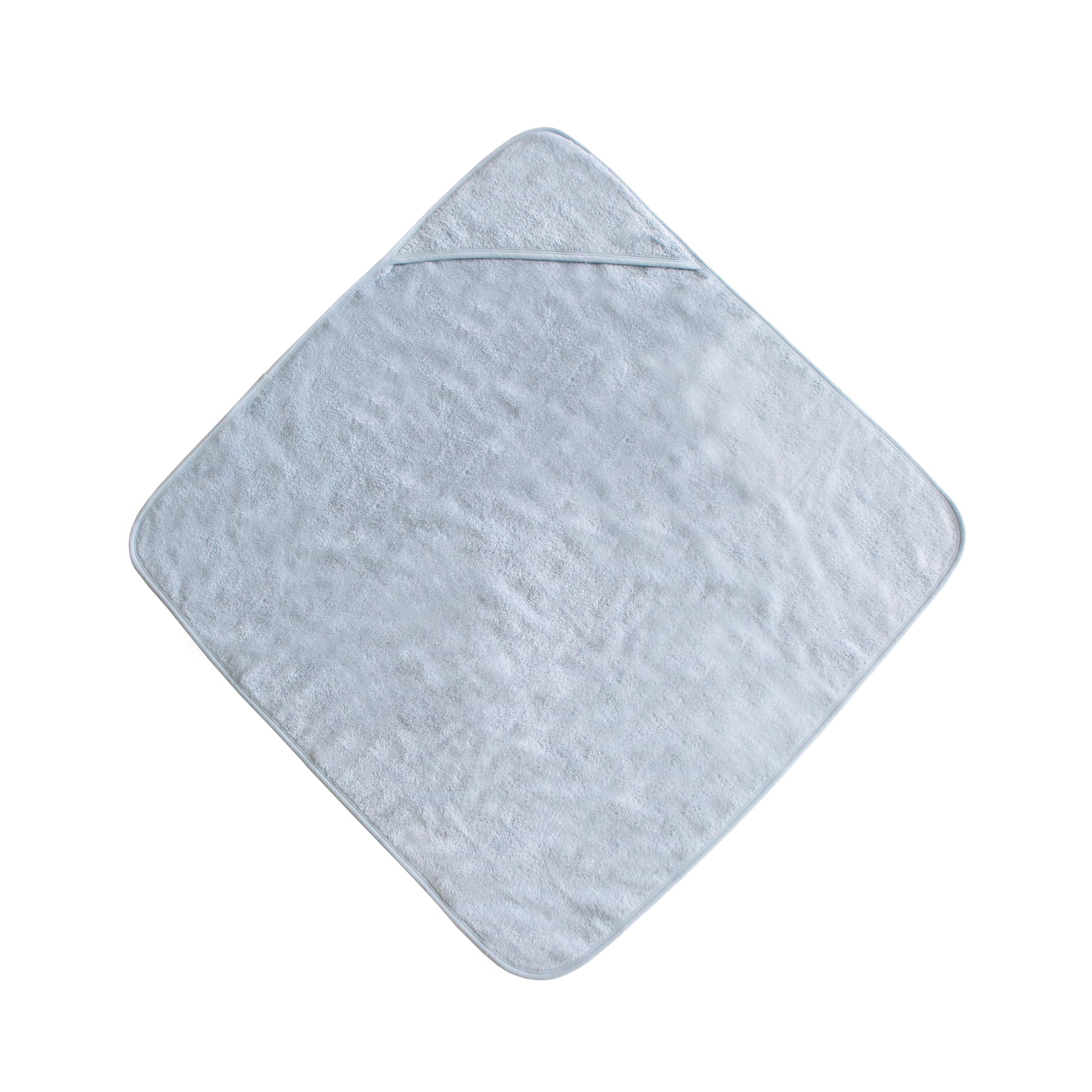 Mushie hooded towel baby blue absorbs water for quick post-bath drying.
