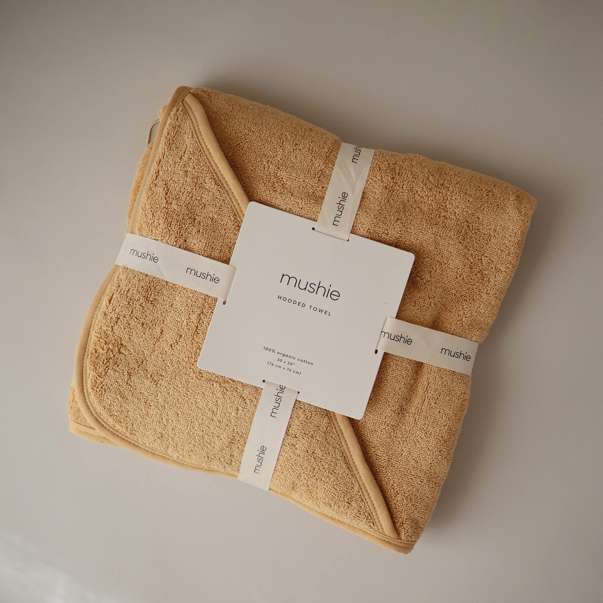 Mushie hooded towel gentle, absorbent material for delicate skin.