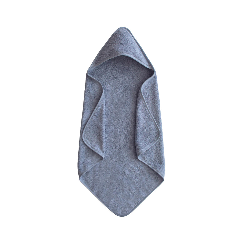 Mushie baby hooded towel made of organic cotton for gentle bath time.