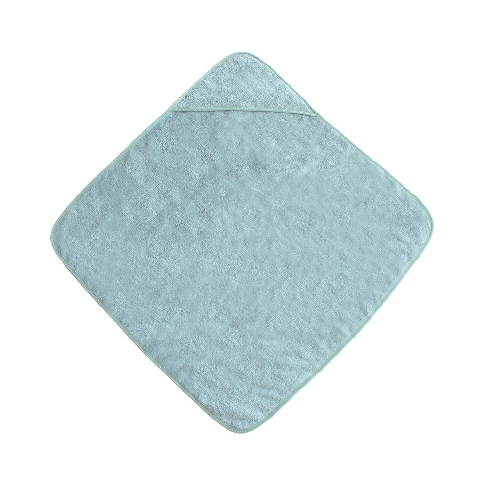 Mushie baby hooded towel Sea Mist folded, compact and easy to store after bath.