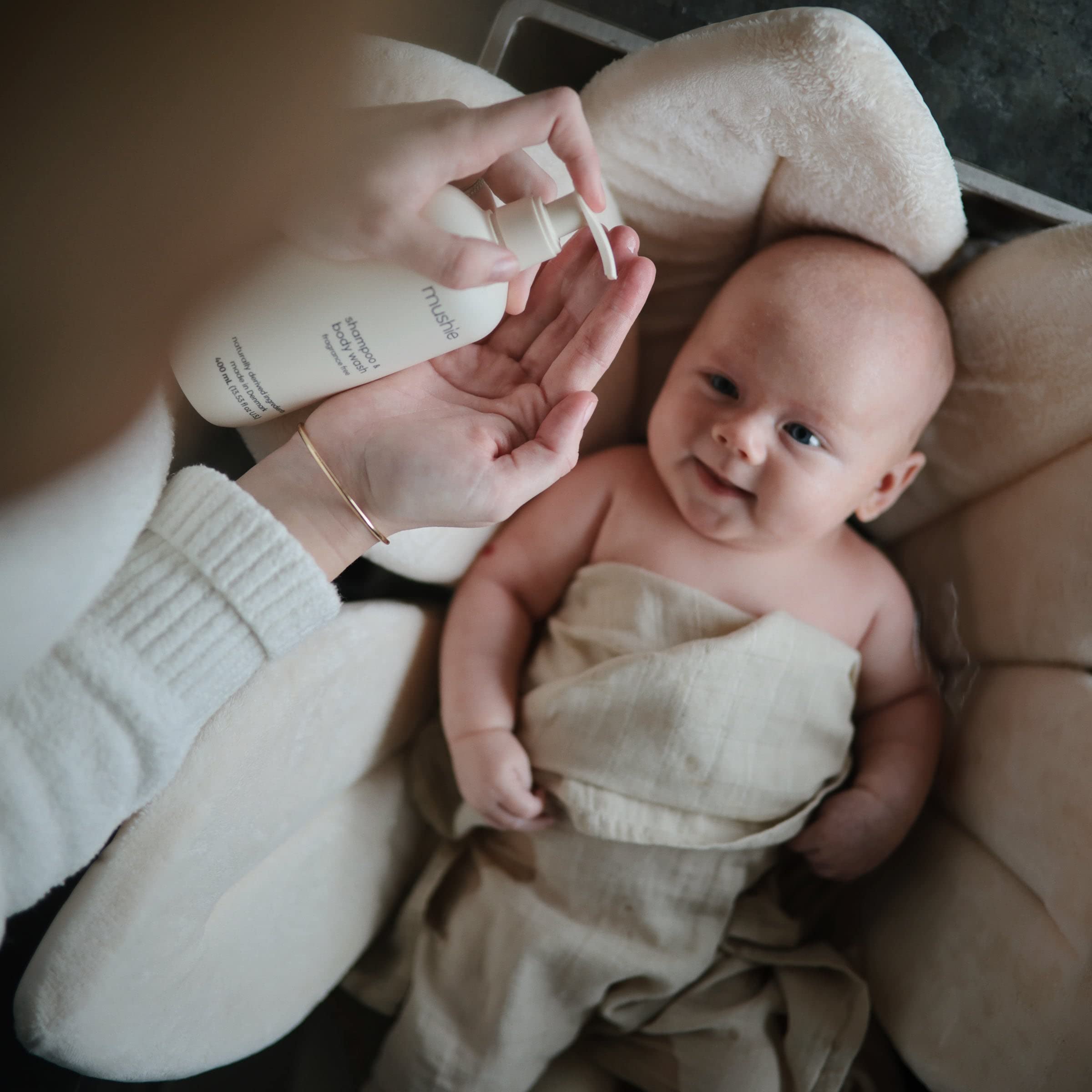 Mushie bottle with easy dispense supports a quick, everyday bath routine.