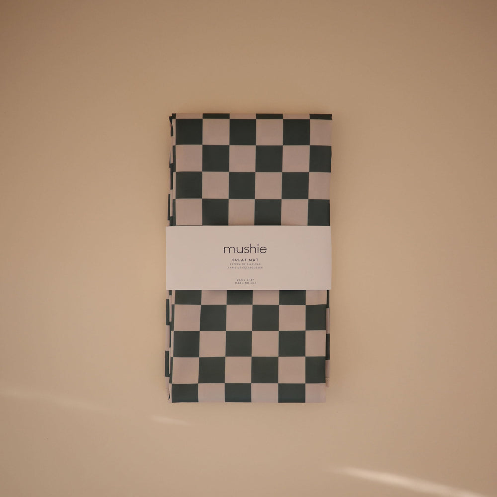 Mushie Olive Check mat protects tables during messy meals