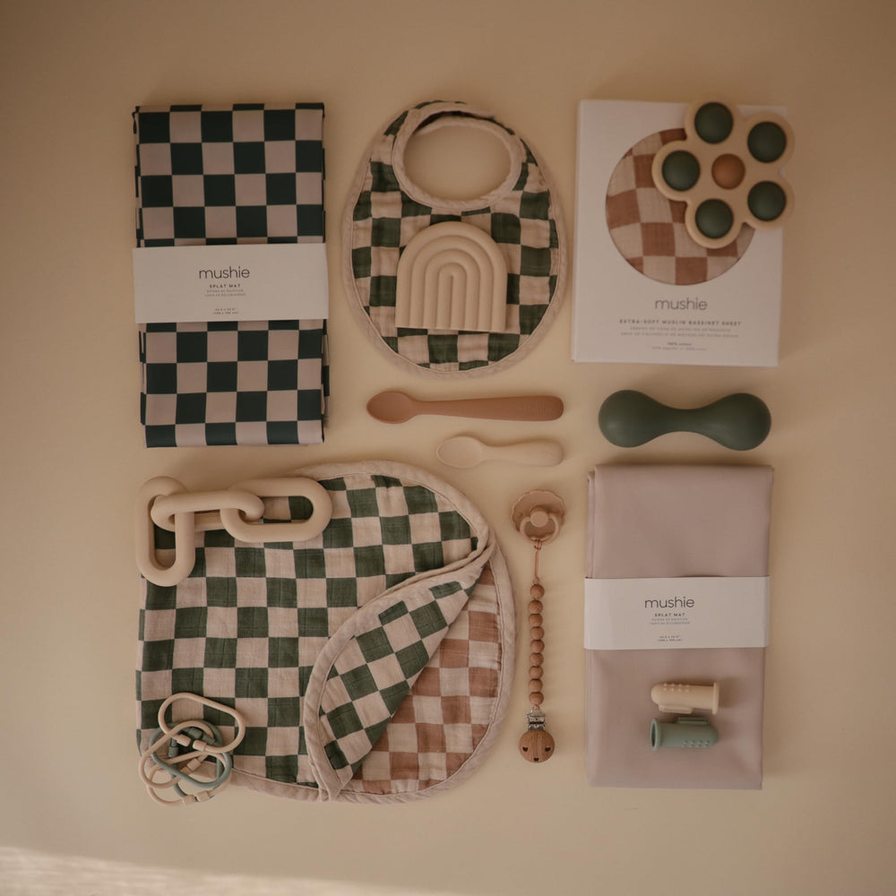 Mushie Olive Check mat measures 42.5x42.5 for wide coverage