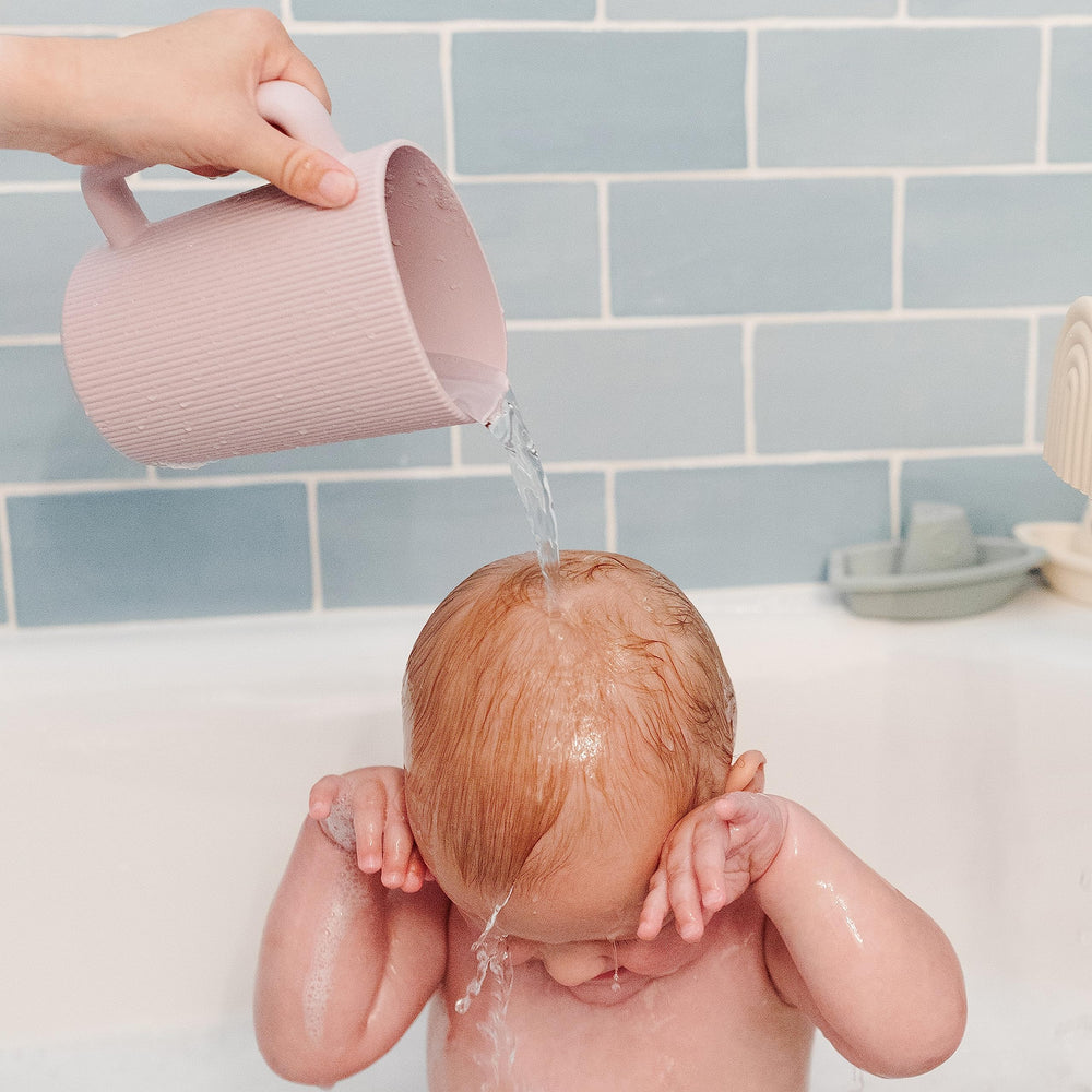 Mushie Cambridge Blue rinse cup complements modern bathroom decor