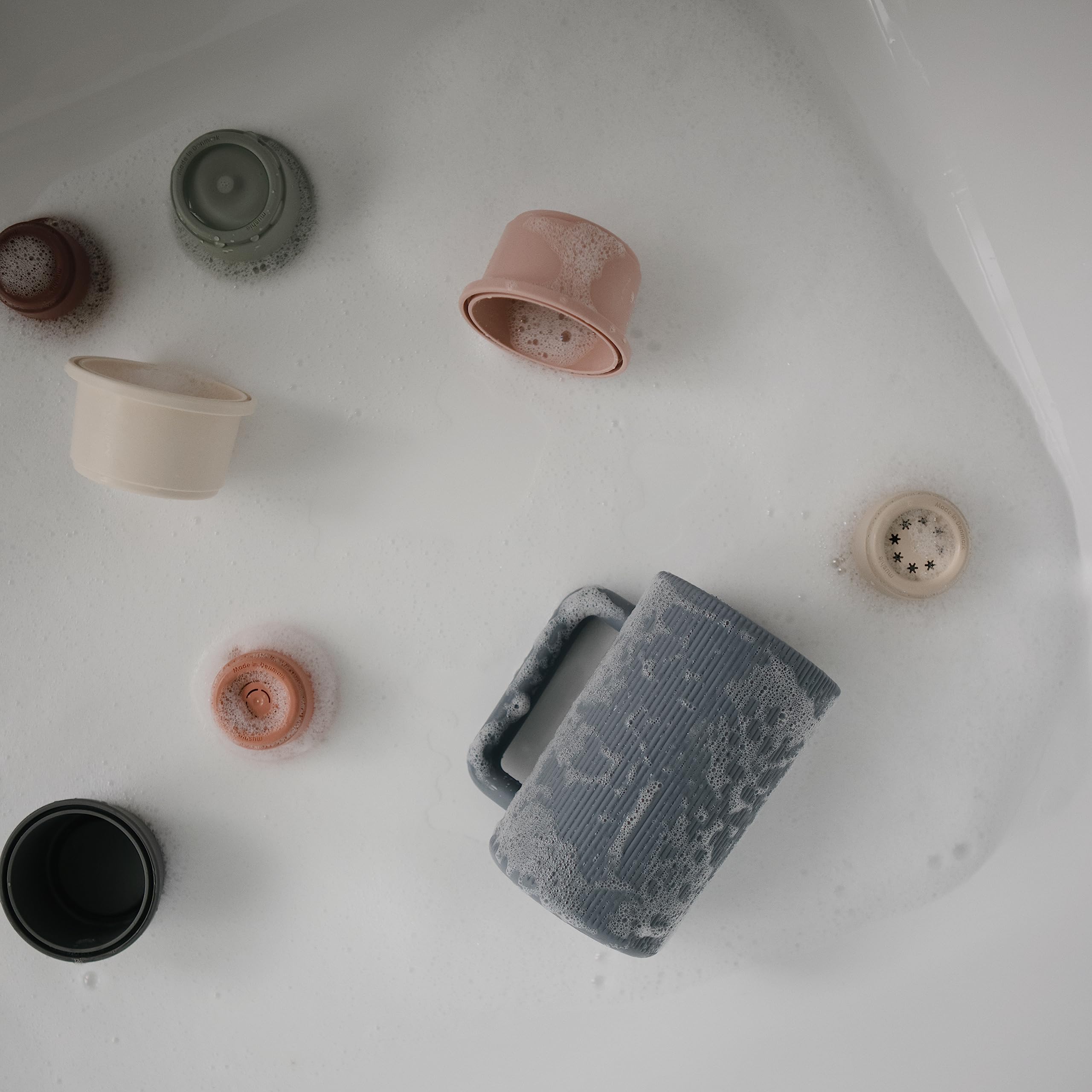 Mushie Bath Rinse Cup on rack suitable for top-rack dishwasher cleaning