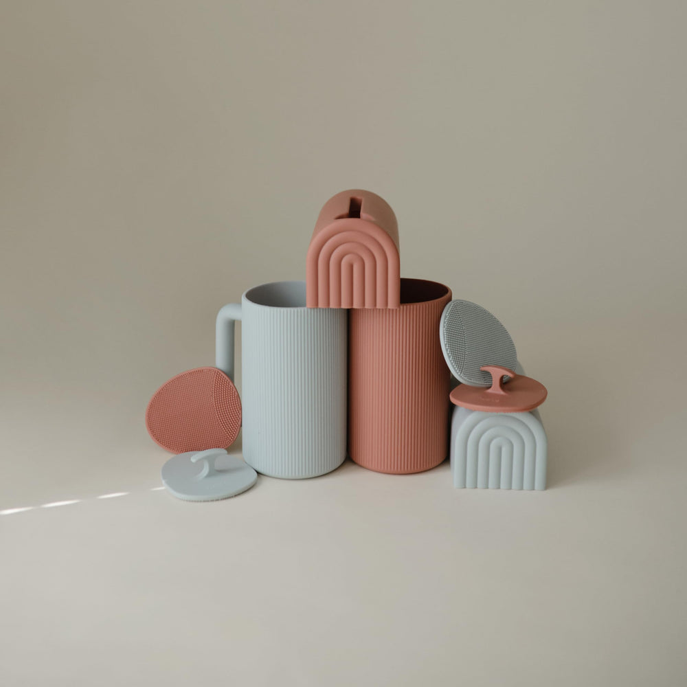 Mushie periwinkle color cues calming bath time ambiance for kids.