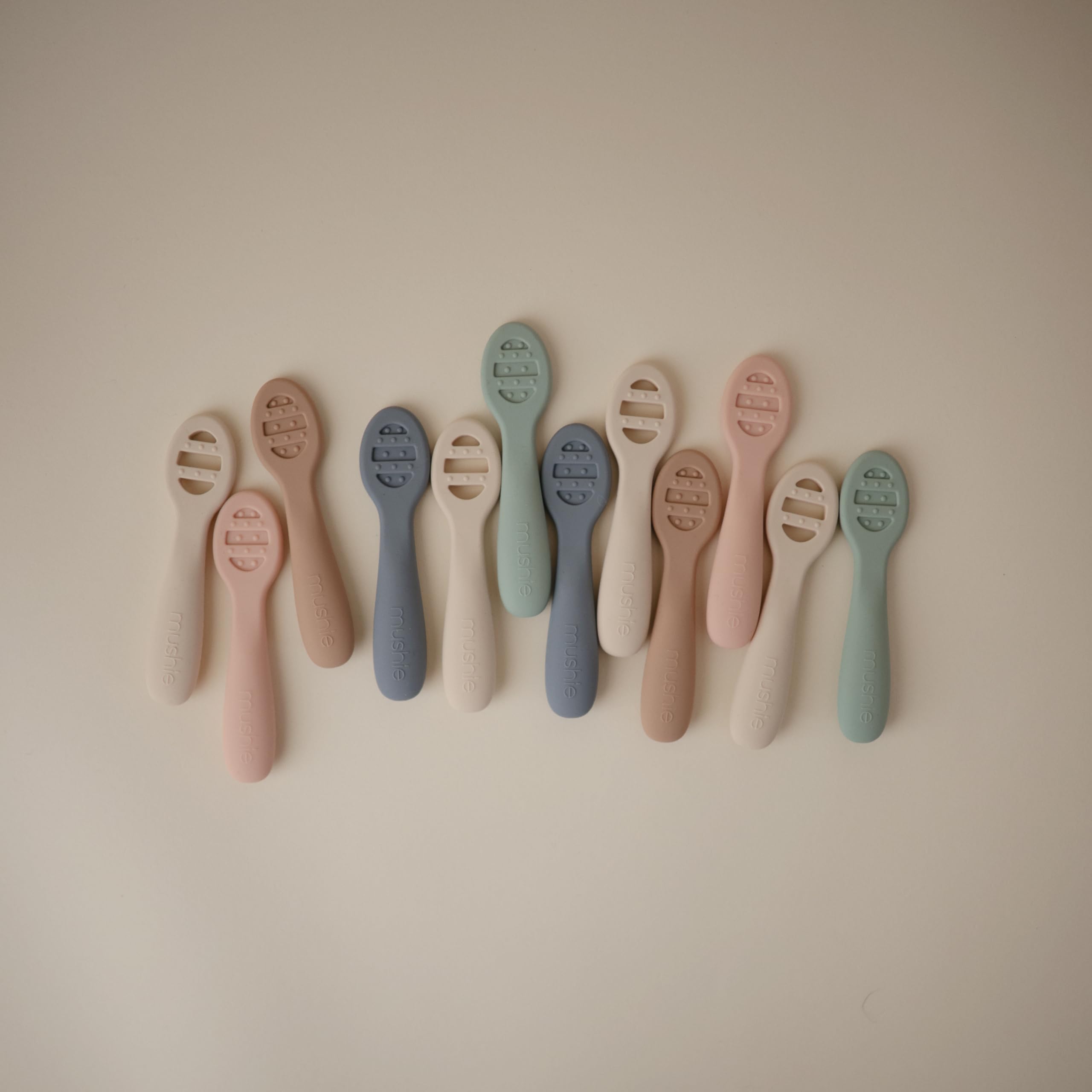 Mushie brand visuals highlighting safety and calm design for families.