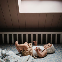 Mushie 52x28 crib sheet fits most USA standard mattresses.