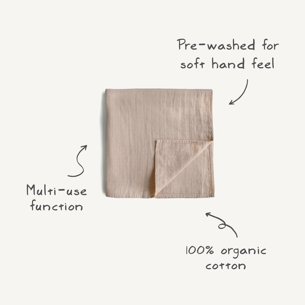 Mushie cuddling moments swaddle demo captures gentle, comforting snuggles