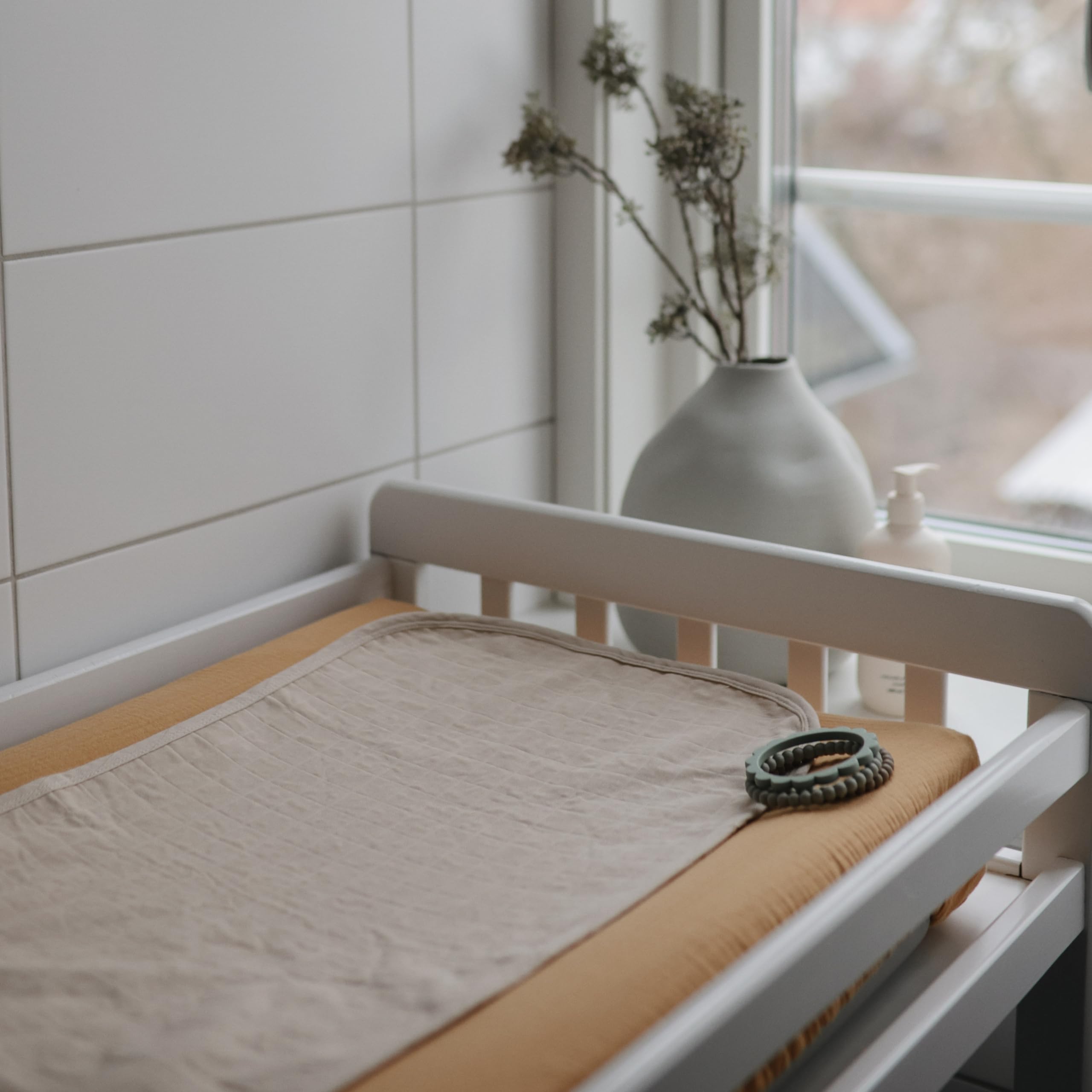 Mushie set offers calm, practical diaper care on the go.