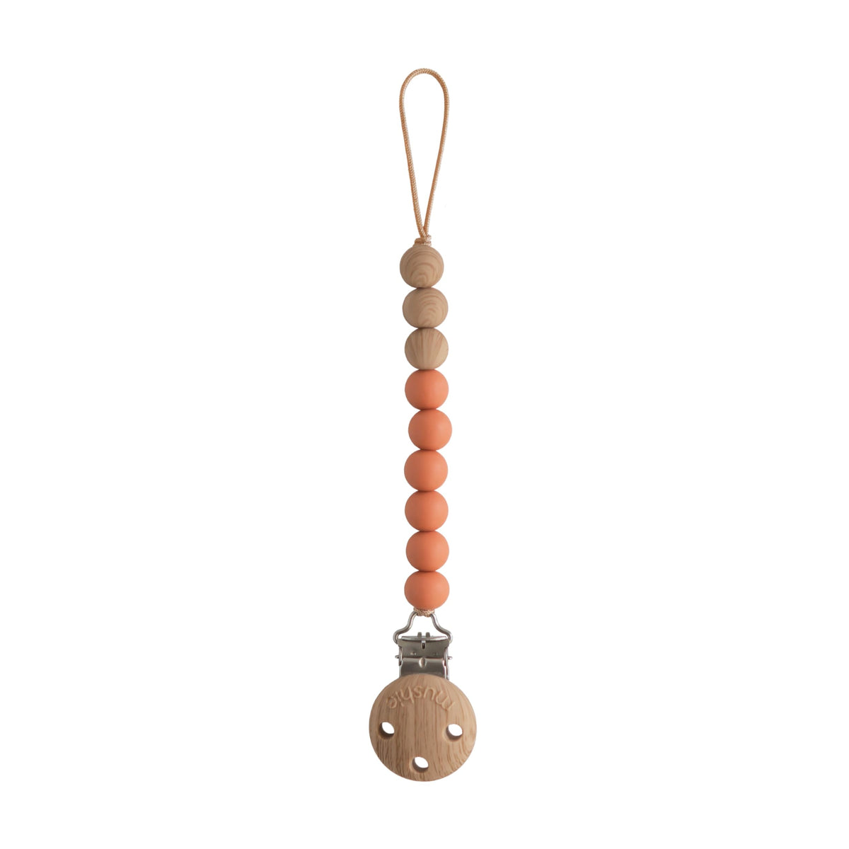 Mushie Eva clip beads closeup shows durable, BPA-free silicone for on-the-go soothing items.