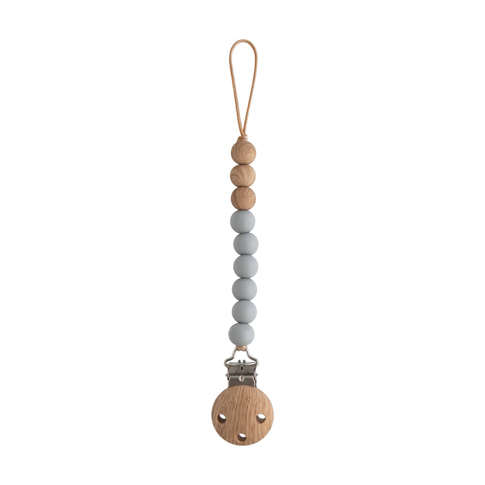 Mushie Eva clip with silicone beads for a durable, stylish pacifier attachment.