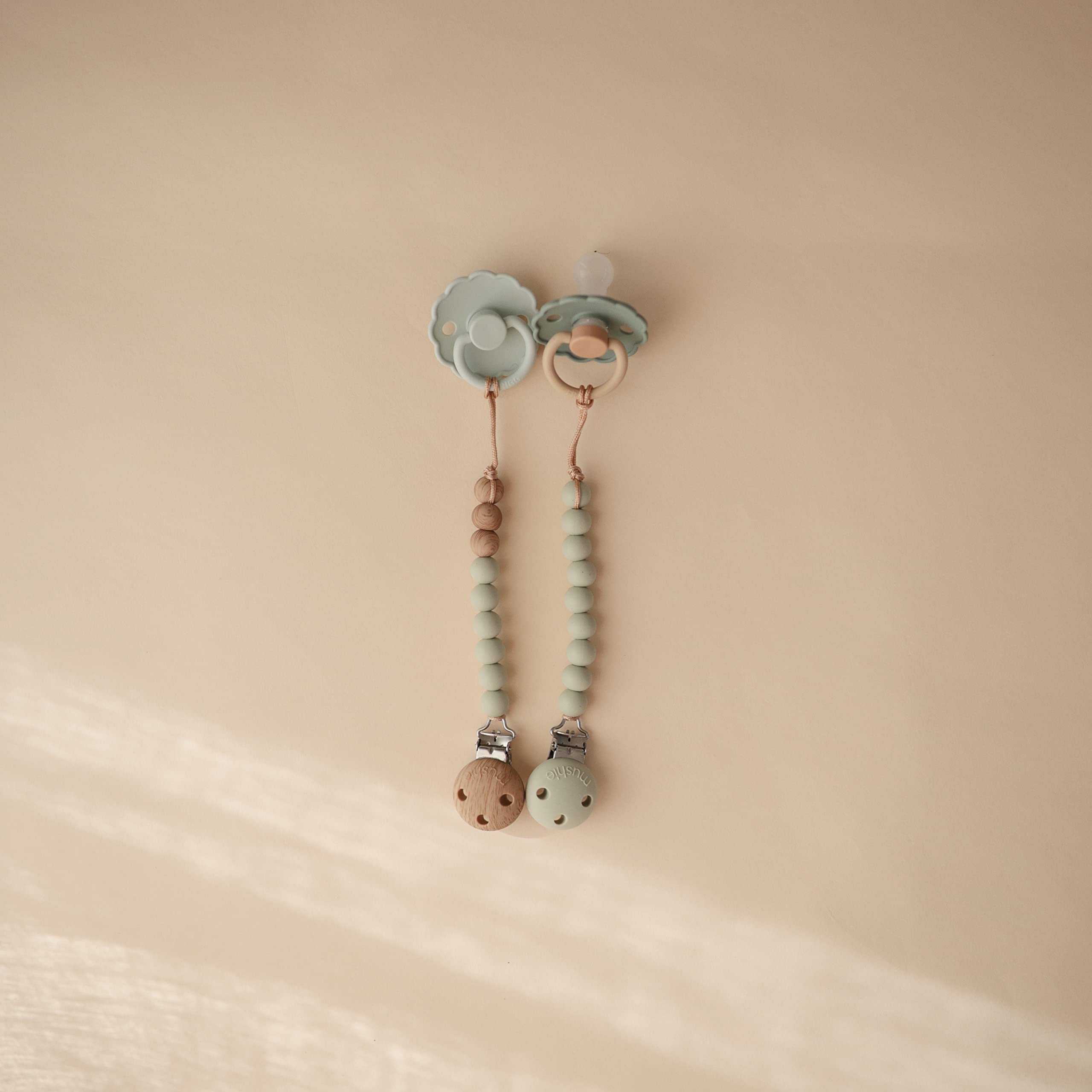Mushie Eva Sage silicone beads showing color coordination for on-the-go use