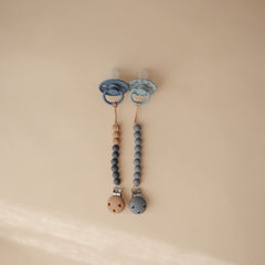 Mushie Eva clip close-up of two-color beads for a stylish accessory