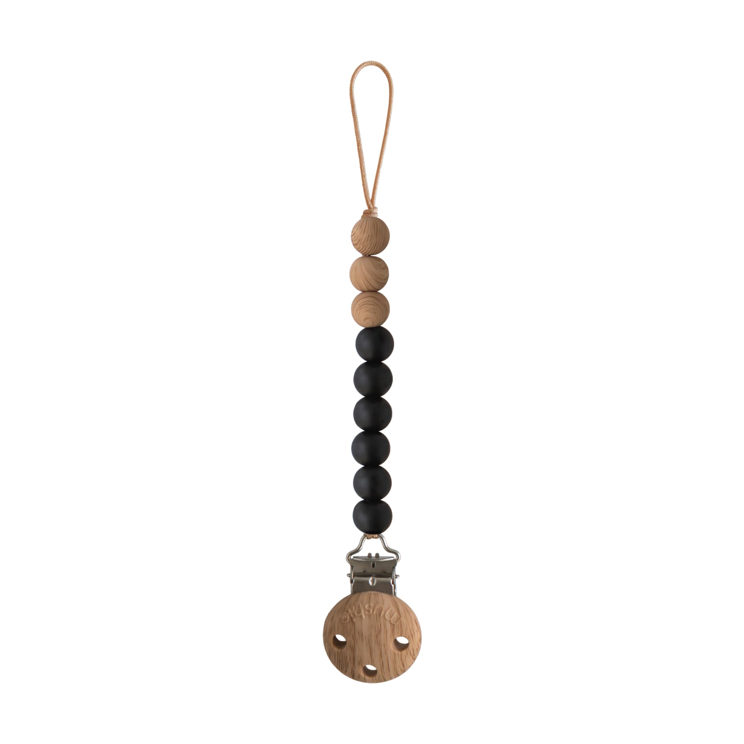 Mushie Eva silicone pacifier clip in black keeps pacifier within reach and tethers it safely.