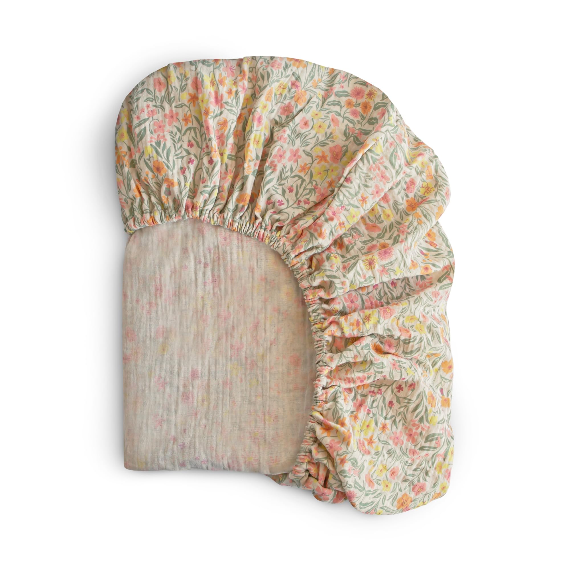 Mushie extra-soft muslin fitted mini crib sheet, Pastel Blooms close-up, breathable comfort for baby.