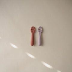 Mushie first-feeding spoons stage 2 open slots for thicker textures.