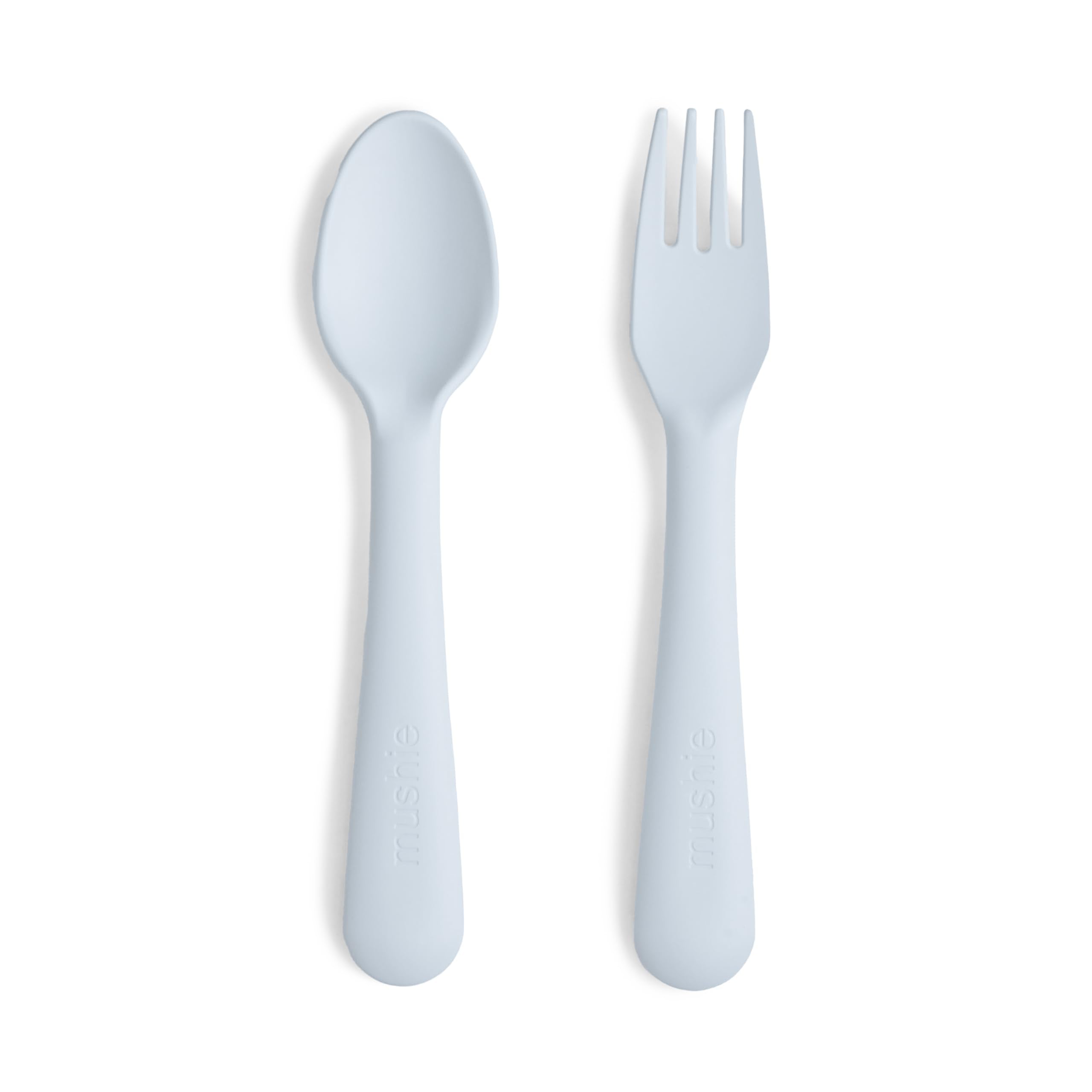 Mushie flatware fork in powder blue close-up, ergonomic grip for little hands.